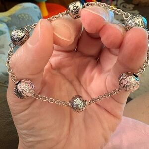 Pandora 5 clip station bracelet with 5 clip beads.